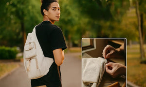 Person wearing a white backpack outdoors with a close-up inset showing hands opening the backpack.